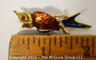 14 kt Gold and Enamel Paint Owl Brooch or Pin.   Measures approximately 2" long and 8.7 g.  Unmarked, Tested as 14 kt.