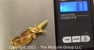 14 kt Gold and Enamel Paint Owl Brooch or Pin.   Measures approximately 2" long and 8.7 g.  Unmarked, Tested as 14 kt.