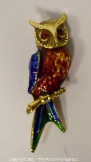 14 kt Gold and Enamel Paint Owl Brooch or Pin.   Measures approximately 2" long and 8.7 g.  Unmarked, Tested as 14 kt.