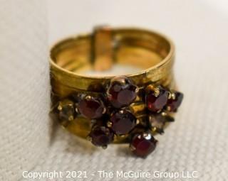 14kt Gold and Ruby Stacked Rings missing two stones.  Size approximately 6 1/2 and 4.5g Weight. 