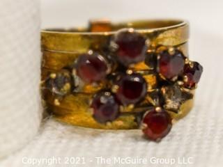 14kt Gold and Ruby Stacked Rings missing two stones.  Size approximately 6 1/2 and 4.5g Weight. 