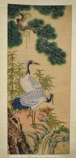 Asian Scroll Painting Depicting Cranes Standing Atop Rocks With Pine Trees Signed with Chopmark.  Silk and Paper.  Measures approximately 18" x 56",