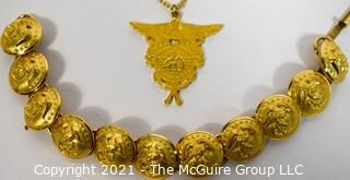 Group of Brass Military Buttons and Pendant. 