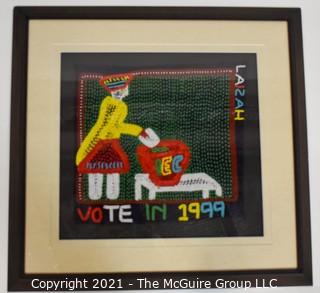 Framed Hand Beaded Fabric Tapestry Laizah IEC Vote 1999.  It measures approximately 23" squre.