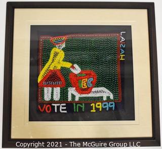 Framed Hand Beaded Fabric Tapestry Laizah IEC Vote 1999.  It measures approximately 23" squre.