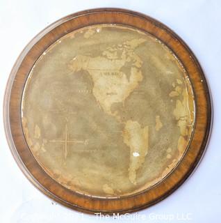 Round Metal Wall Plaque Mounted on Wood with Map of the World.  Measures approximately 21" diameter