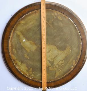 Round Metal Wall Plaque Mounted on Wood with Map of the World.  Measures approximately 21" diameter