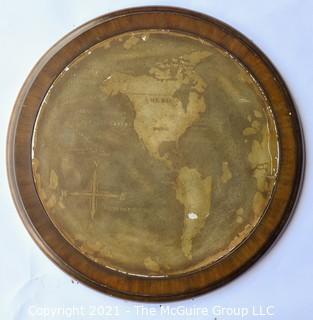 Round Metal Wall Plaque Mounted on Wood with Map of the World.  Measures approximately 21" diameter