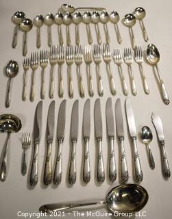 Set of Lunt Sterling Silver Flatware & Serving Utensils in "Sweetheart Rose" Pattern in Box.  Weighs approximately 1260 grams excluding knives. 