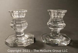 Baccarrat Clear Crystal Candlesticks or Holders.  Each measures approximately 3 1/2" tall and 3" wide at the base.