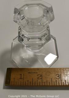 Baccarrat Clear Crystal Candlesticks or Holders.  Each measures approximately 3 1/2" tall and 3" wide at the base.