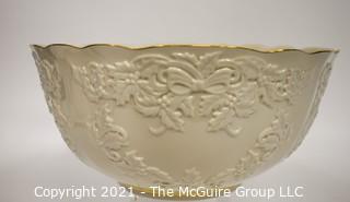 Lenox Porcelain Holiday Hostess Collection Punch Bowl with Gold Trim.   Measures approximately 12 1/2" in diameter and 6" tall.