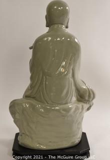 Large Ceramic with Green Glaze Asian Flute Player on Base made by Austin Prod. Inc.   It measures approximately 