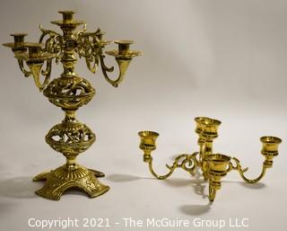 Two Ornation Brass Candlesticks with 4 and 5 Lights. 