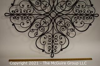 Large Wrought Iron Scroll Work Wall Decoration.   Measures approximately 38" in width. 