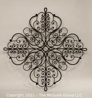 Large Wrought Iron Scroll Work Wall Decoration.   Measures approximately 38" in width. 