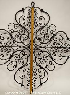 Large Wrought Iron Scroll Work Wall Decoration.   Measures approximately 38" in width. 