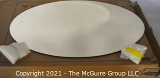 Gatco Beveled Framed Oval Tilting Wall Mount Mirror, New in Box.  Measures approximately 19-1/2" x 27-1/2" 