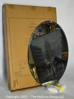 Gatco Beveled Framed Oval Tilting Wall Mount Mirror, New in Box.  Measures approximately 19-1/2" x 27-1/2" 