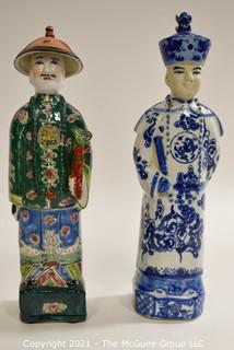 Two (2) Porcelain Hand Painted Asian Warrior Statues with Incised Chopmark Stamp on Base.   They measure approximately 11" tall. 