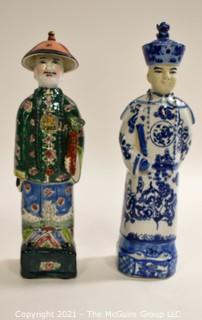 Two (2) Porcelain Hand Painted Asian Warrior Statues with Incised Chopmark Stamp on Base.   They measure approximately 11" tall. 