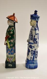 Two (2) Porcelain Hand Painted Asian Warrior Statues with Incised Chopmark Stamp on Base.   They measure approximately 11" tall. 