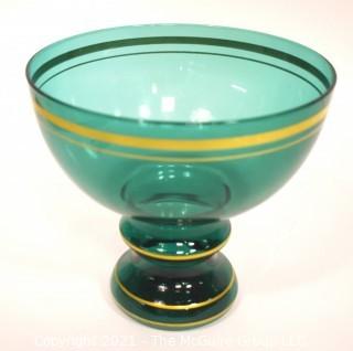 Green Glass with Gilt Trim Pedestal Bowl.  Measures approximately 8" tall.