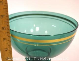 Green Glass with Gilt Trim Pedestal Bowl.  Measures approximately 8" tall.