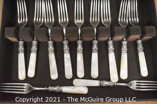 WM Rogers 12 dwt. marked Sterling and Mother of Pearl Handled Flatware Set in Box.  
