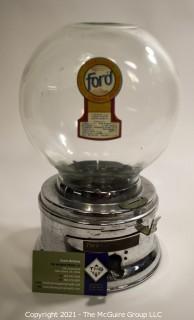 Ford Table Top Penny Gumball Machine with Original Glass Globe.  Working condition.  It measures approximately 12" tall.