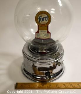 Ford Table Top Penny Gumball Machine with Original Glass Globe.  Working condition.  It measures approximately 12" tall.