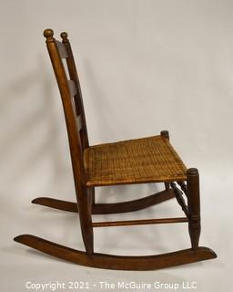 Primitive Hand Made Rocking Chair with Woven Cane Seat. 