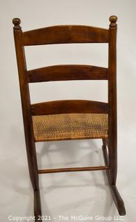 Primitive Hand Made Rocking Chair with Woven Cane Seat. 