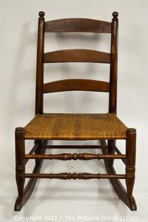 Primitive Hand Made Rocking Chair with Woven Cane Seat. 