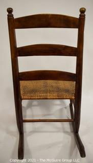 Primitive Hand Made Rocking Chair with Woven Cane Seat. 