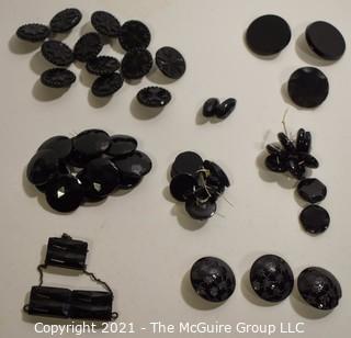 Collection of Antique Hand Carved or Cut Black Jet Glass Buttons and Embelishments. 