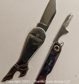 Group of Barware. Includes Horn Bottle Opener, Sterling Silver Duplicate Bridge Prize Bottle Opener, Two Chrome Jiggers, Two (2) Pocket Knives, Parrot Bottle Opener and Etched Dish. 