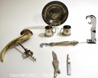 Group of Barware. Includes Horn Bottle Opener, Sterling Silver Duplicate Bridge Prize Bottle Opener, Two Chrome Jiggers, Two (2) Pocket Knives, Parrot Bottle Opener and Etched Dish. 