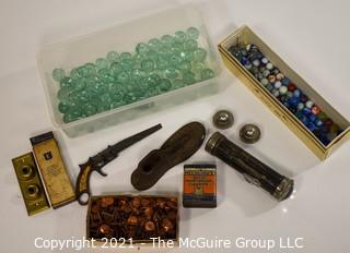 Eclectic Assortment Including Marbles, Shoemakers Last, Eveready Flashlight, Metal Saw, Large Ball Bearings, Button Electrical Switch Plate For Wall & Box Of Copper Tacks.