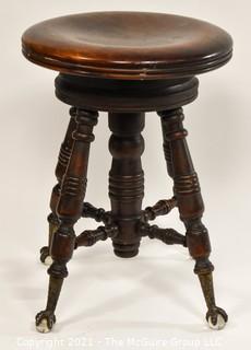 Mahogany Piano Stool with Brass Claw and Glass Feet; made by A. Merriam and Co., MASS