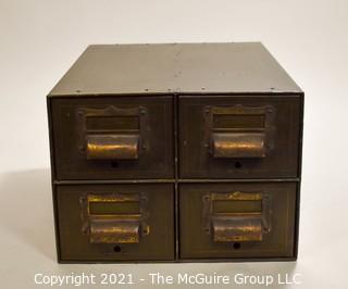 Four (4) Metal File Drawers. 