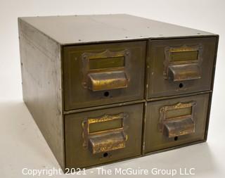 Four (4) Metal File Drawers. 