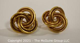 Oversized Love Knot or French Knot 14K Gold Earrings with Pierced Clip Back.  They measure approximately 1" wide; weigh 7.3g (Note:  Description was changed as of April 29; 5pm ET)