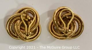 Oversized Love Knot or French Knot 14K Gold Earrings with Pierced Clip Back.  They measure approximately 1" wide; weigh 7.3g (Note:  Description was changed as of April 29; 5pm ET)