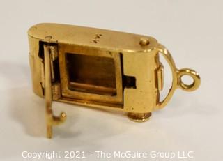 14 kt Gold Articulated Antique Camera Charm or Pendant.  It weighs approximately 5gr. 