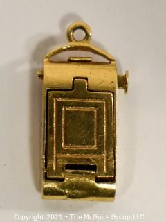 14 kt Gold Articulated Antique Camera Charm or Pendant.  It weighs approximately 5gr. 