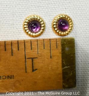 14 Kt Gold Round Stud Earrings with Purple Gemstone Center.  They measure approximately 1/2" in diameter and weigh approximately .9 gr. 