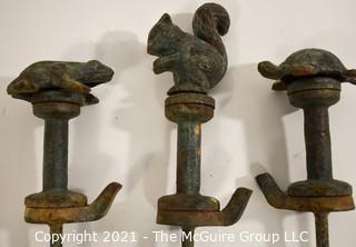 Vintage Cast Iron Garden Hose Spikes or Guides With Animal Toppers - Frog, Squirrel & Turtle.  Measures approximatley 22" tall.