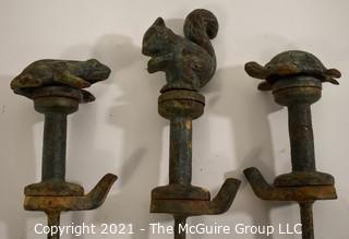 Vintage Cast Iron Garden Hose Spikes or Guides With Animal Toppers - Frog, Squirrel & Turtle.  Measures approximatley 22" tall.