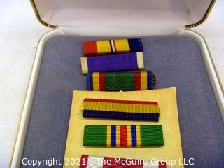 Collectible: Militaria: assortment of 9 ribbons in case from another medal